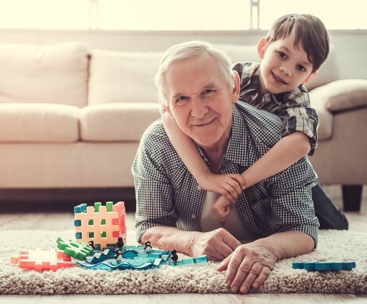 Grandpa playing with child